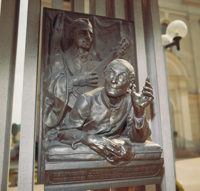 Statue of Franz Gruber on guitar and Father Josef Mohr in Oberndorf