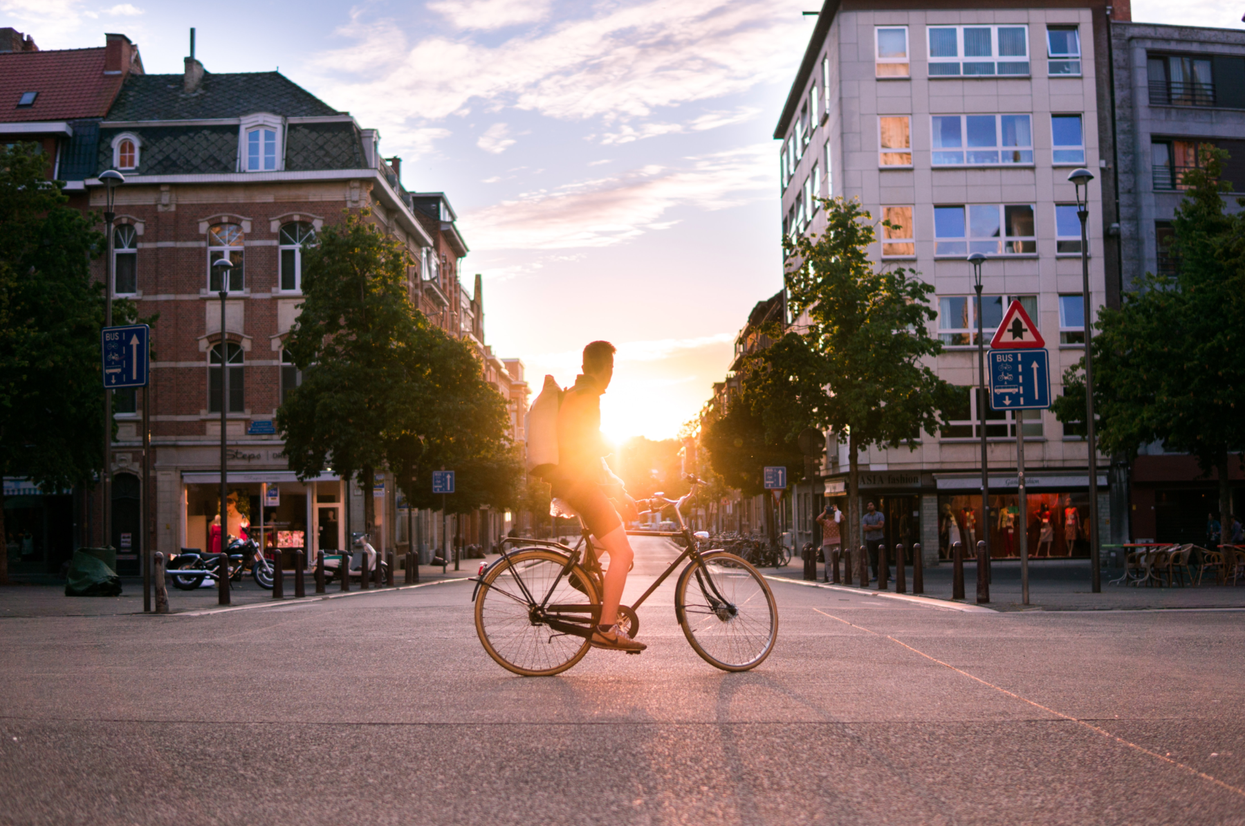 Cycling in the city at sunset.