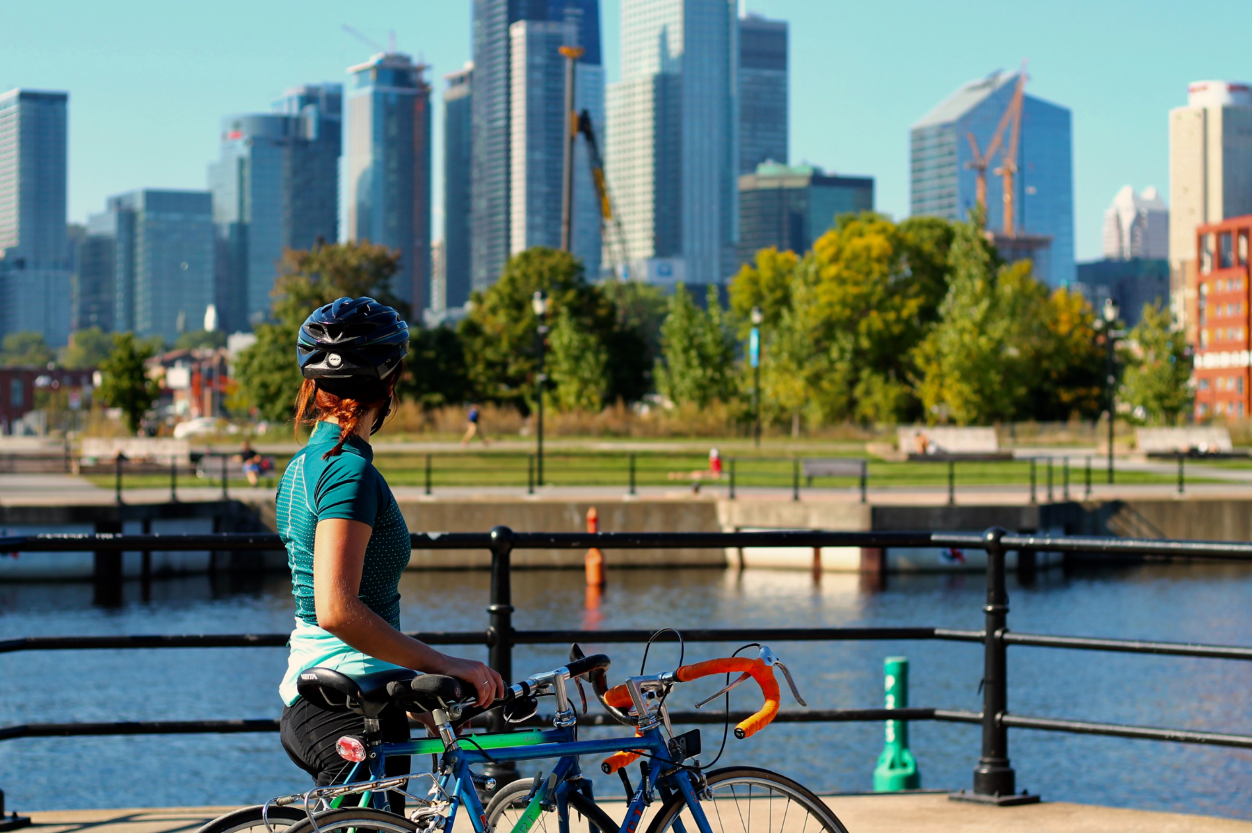 Admiring the skyline with a bicycle.